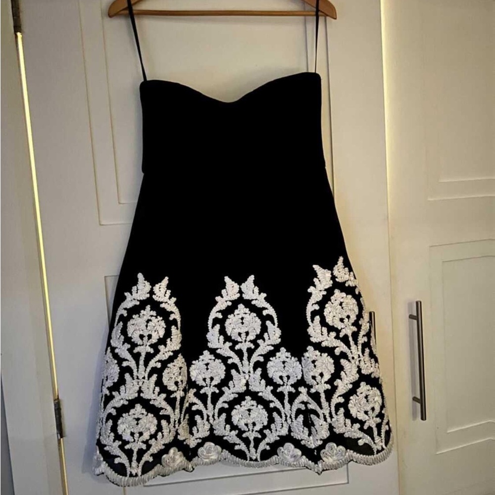 Strapless black dress with white detail
